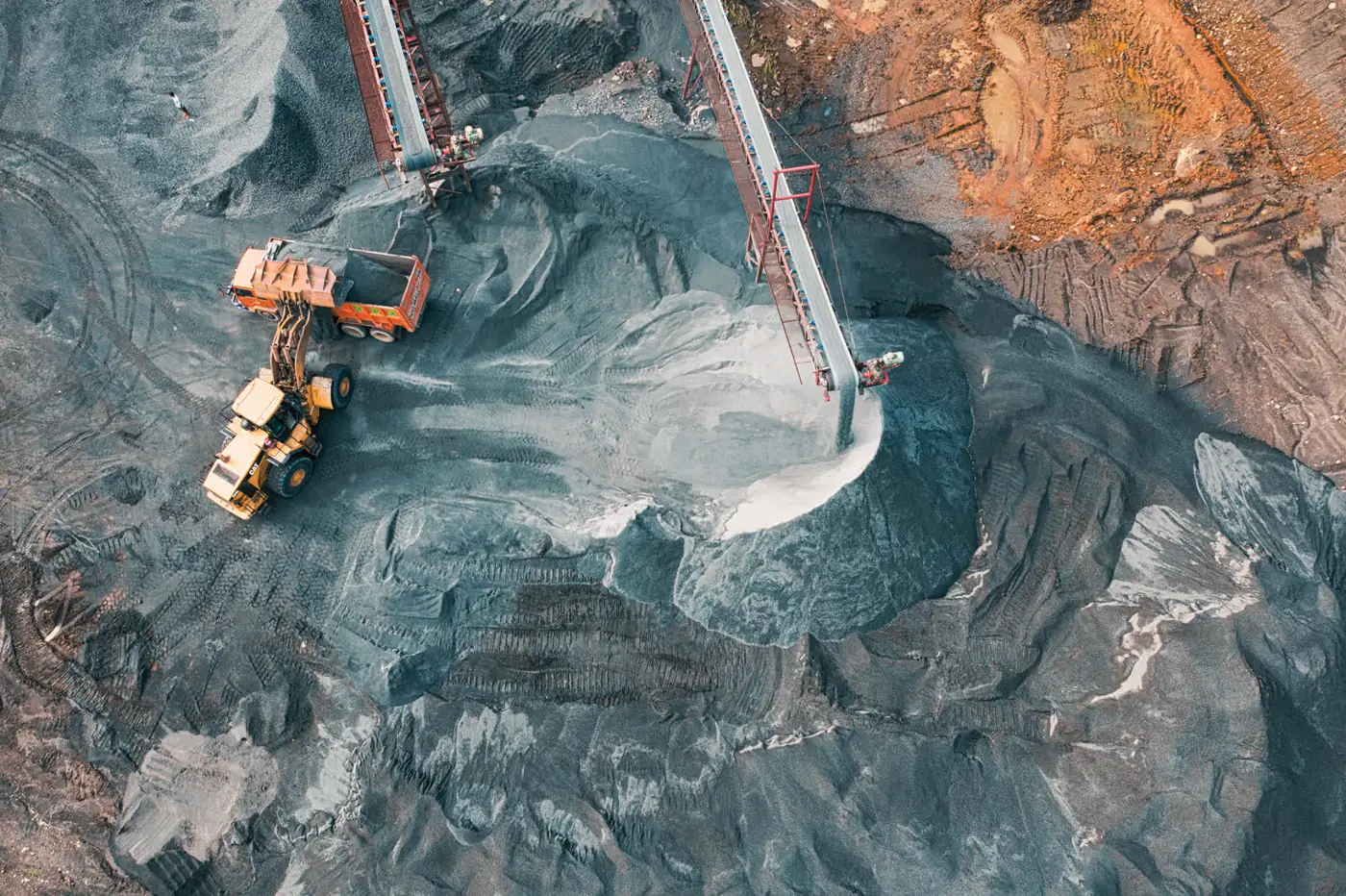 Haul truck working in an open-pit mine, seen from above